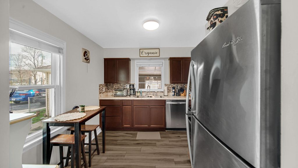 Photo of 8345 Walnut Drive, Munster, IN 46321 (MLS # 836676)