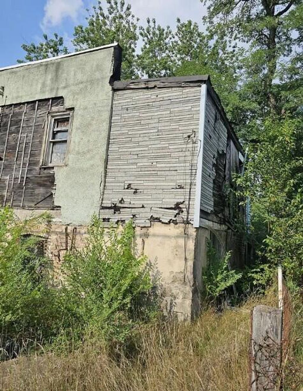 Photo of 1545 Van Buren Street, Gary, IN 46407 (MLS # 835987)