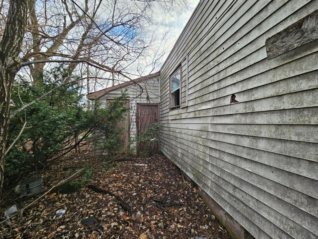 Photo of 1695 W 10th Avenue, Gary, IN 46404 (MLS # 832596)