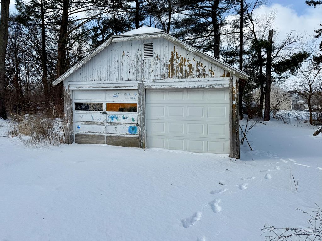 Photo of 211 W Main Street, Medaryville, IN 47957 (MLS # 833568)