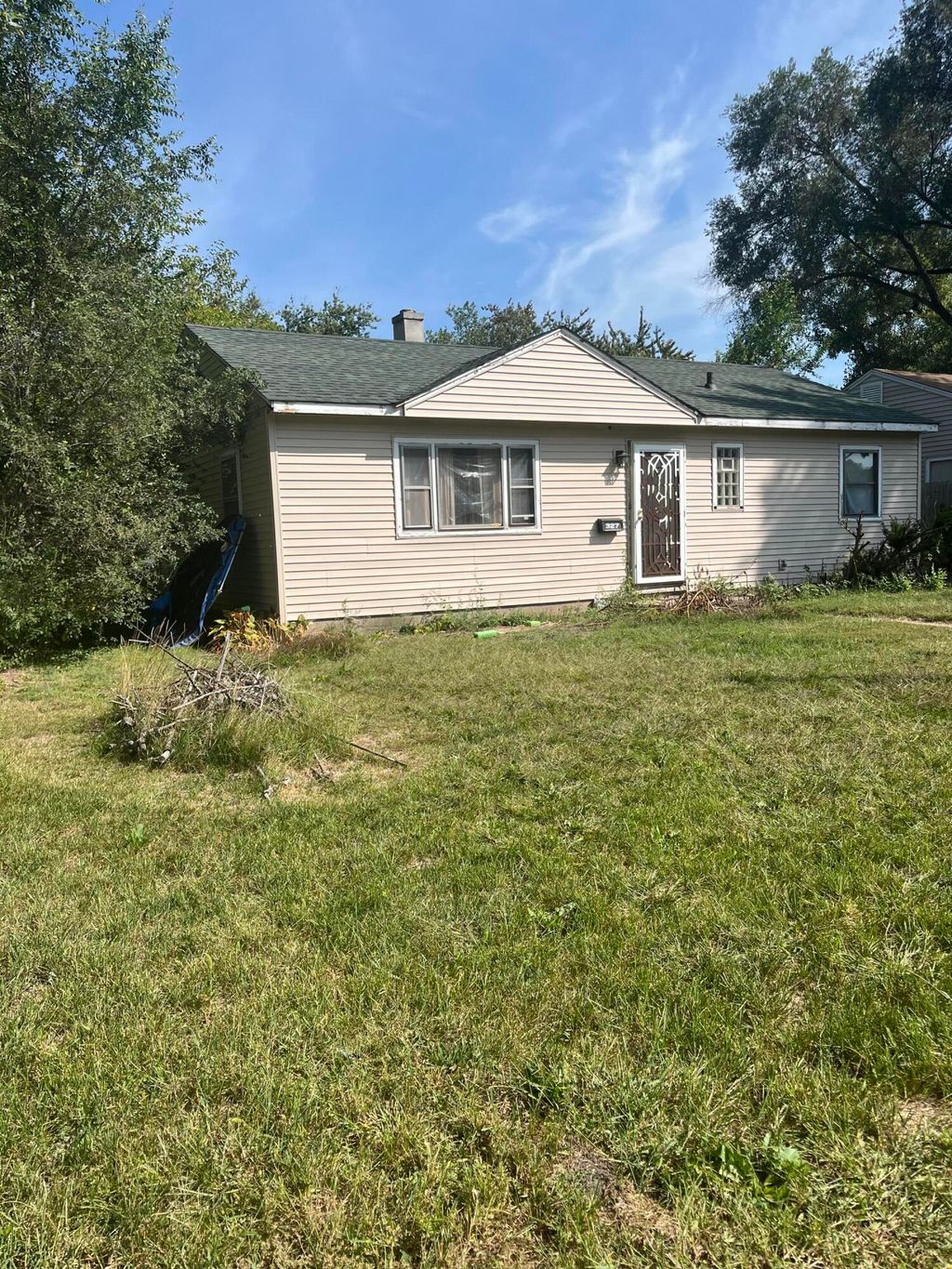 Photo of 327 N Grand Boulevard, Gary, IN 46403 (MLS # 835979)