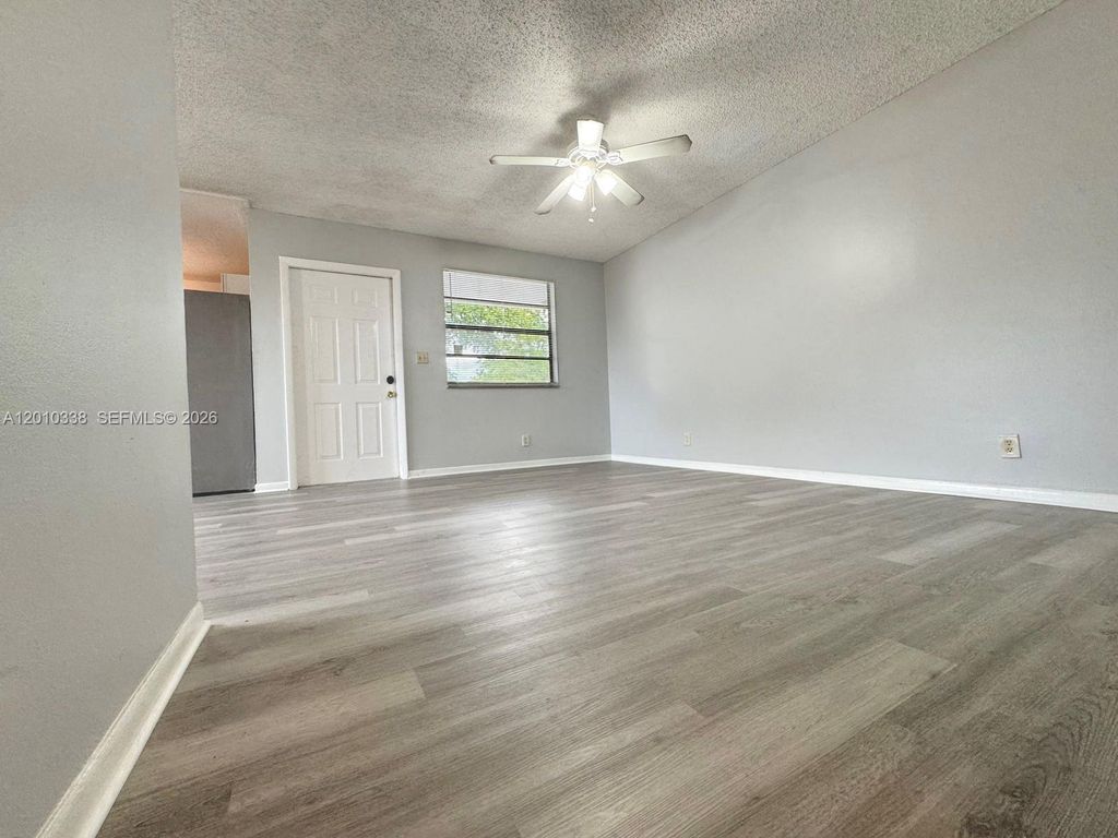 Photo of 10947 NW 45th St, Coral Springs, FL 33065 (MLS # A12010338)