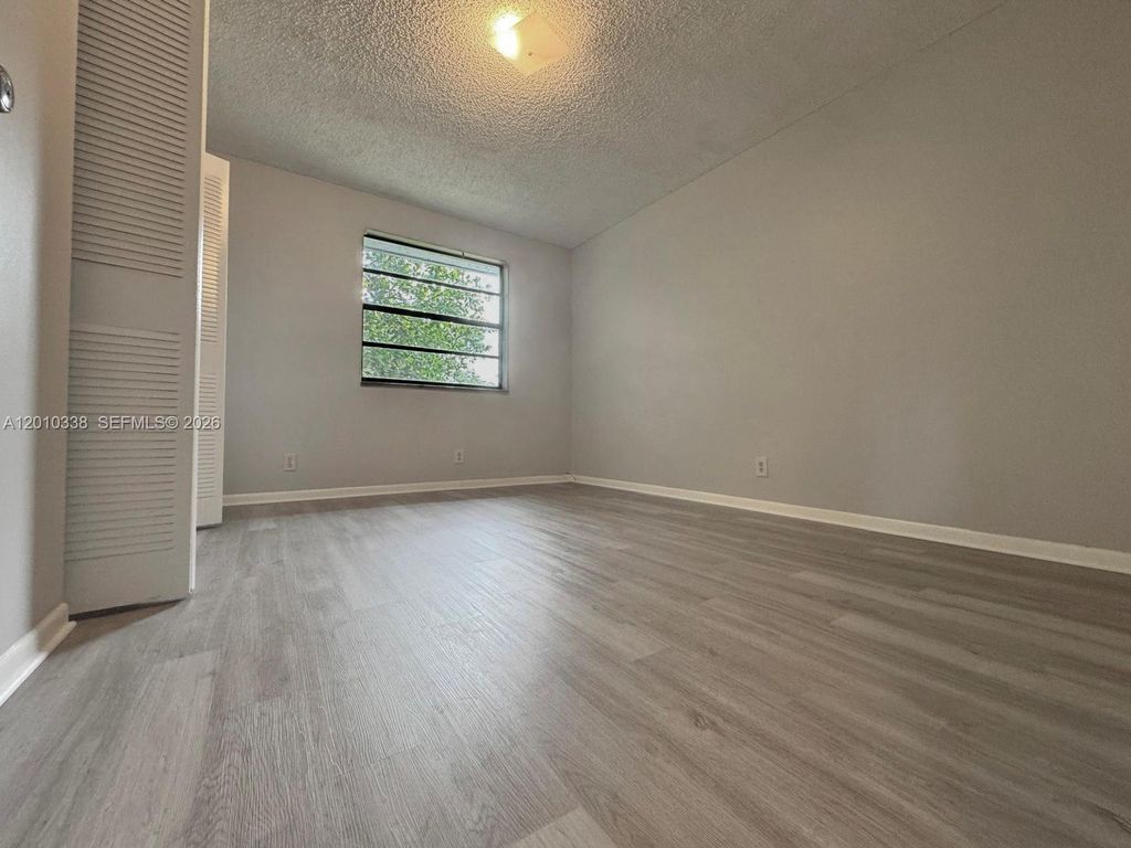 Photo of 10947 NW 45th St, Coral Springs, FL 33065 (MLS # A12010338)