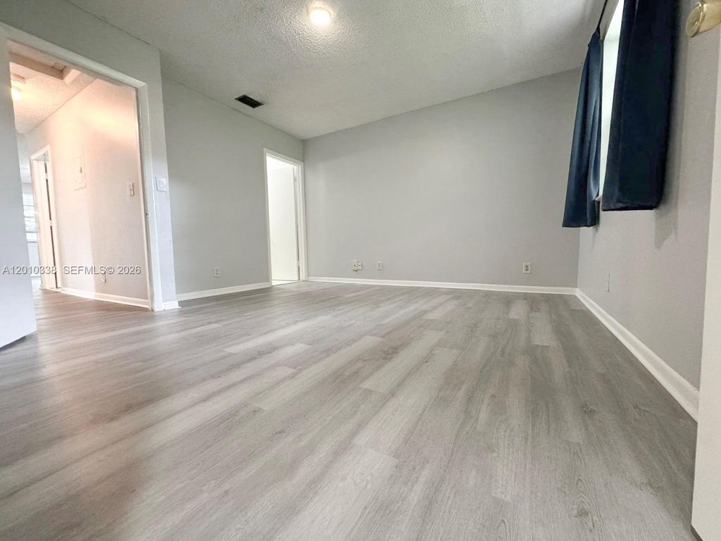 Photo of 10947 NW 45th St, Coral Springs, FL 33065 (MLS # A12010338)