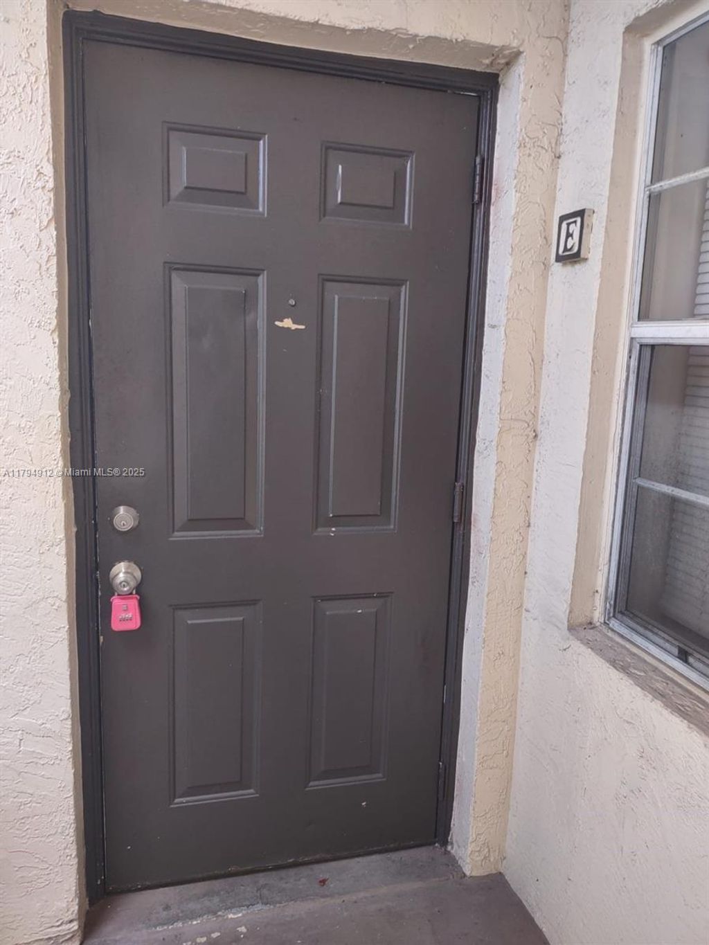 Photo of 680 Cypress Club Way #E10, Deerfield Beach, FL 33064 (MLS # A11794912)