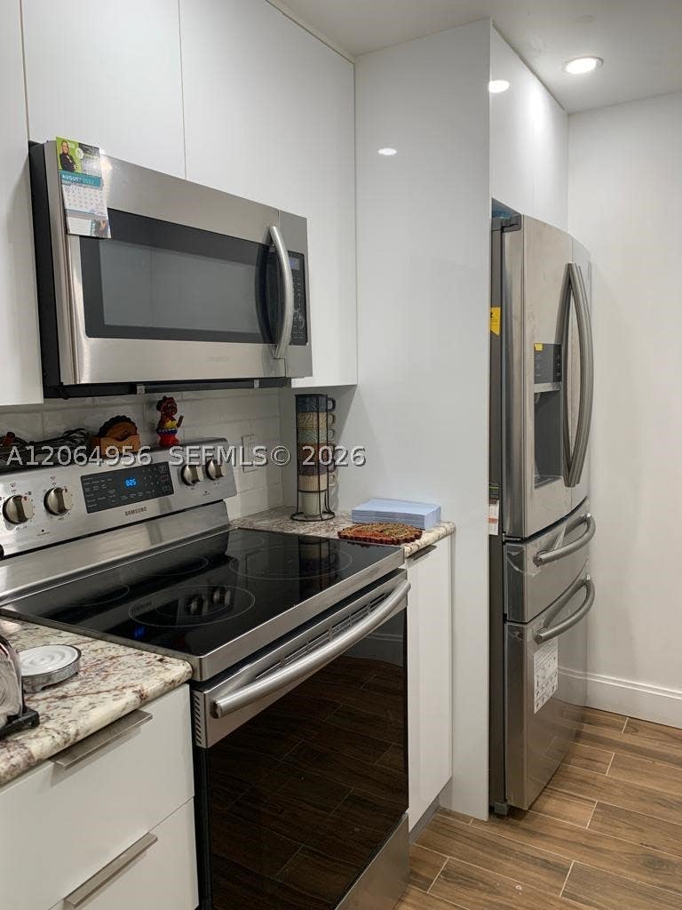 Photo of 151 SW 135th Ter #109T, Pembroke Pines, FL 33027 (MLS # A12064956)