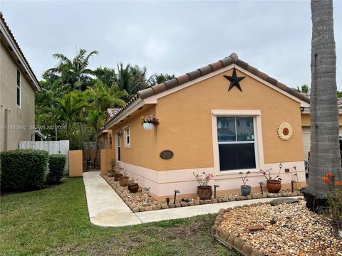 Photo of 2102 NW 193rd Ave, Pembroke Pines, FL 33029 (MLS # A11985600)