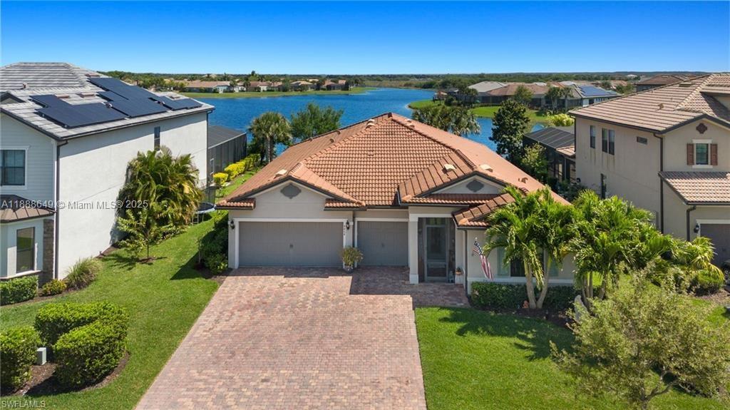 Nothing is better than living on the water! This beautifully maintained Creekview model sits on one of Avalon Park’s best long-lake lots, close to the heart of Ave Maria. Single-story ranch with impact windows, it features 4 bedrooms, 3 baths, and a flex room. The spacious kitchen shines with granite counters and stainless appliances, perfect for entertaining. Elegant details include crown molding, trim accents, and a glass entry door. Bedrooms offer new carpet and fresh paint. Outside, enjoy breathtaking views from a fully fenced yard with oversized lanai, heated saltwater pool, and direct bath access. Ave Maria amenities include dining, parks, fitness center, sports fields, salon, pickleball, Publix, shopping, and more.
