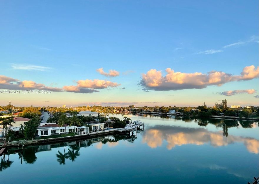 Imagine coming home to a sunset over the Intracoastal and bay—the sky shifting evenings as water moves below. This waterfront corner penthouse is a 2-bedroom, 2-bath residence that offers 1,318 square feet of interior space—the largest in the building—paired with unobstructed Intracoastal and bay views and a western orientation showing spectacular sunsets.

The home features two private balconies, one off the living room and another off the kitchen, creating rare, usable outdoor spaces overlooking open water. The unit is well maintained and retains its original character, offering immediate comfort and the flexibility to personalize at your own pace—without urgency or compromise.

What cannot be replicated is the penthouse elevation, open exposure, and sweeping outlook—timeless attributes that define its value. Additional highlights include central A/C, separate storage, one assigned parking space, and a waterfront building with a pool.

Ideally located in North Beach, residents enjoy proximity to world-class shopping, newly renovated parks, and a diverse dining scene offering something for every palate. The beach is moments away, while the Intracoastal Waterway becomes an extension of daily life—perfect for kayaking or canoeing from the building’s private dock.

A rare opportunity to acquire a true penthouse with exceptionally low monthly maintenance, generous square footage, and amazing water views in one of Miami Beach’s most rapidly evolving coastal communities.