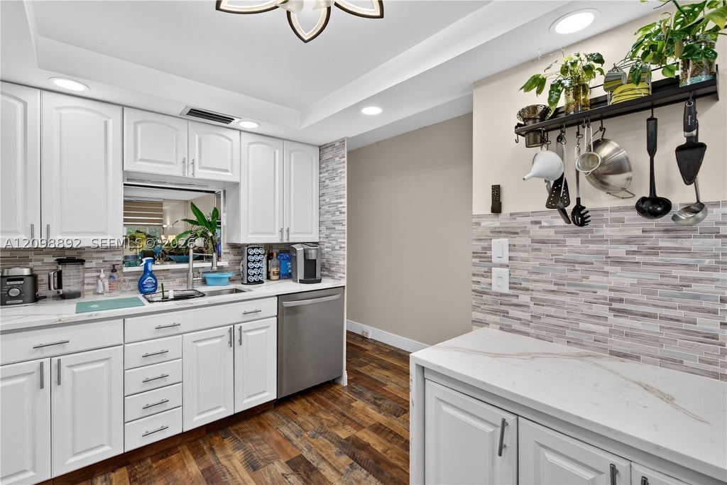Photo of 2501 Antigua Ter #C3, Coconut Creek, FL 33066 (MLS # A12098892)