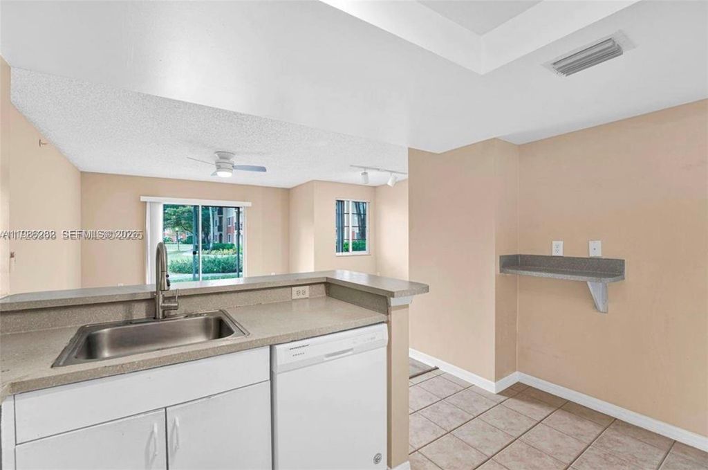 Photo of 4195 N Haverhill Rd #304, West Palm Beach, FL 33417 (MLS # A11986282)