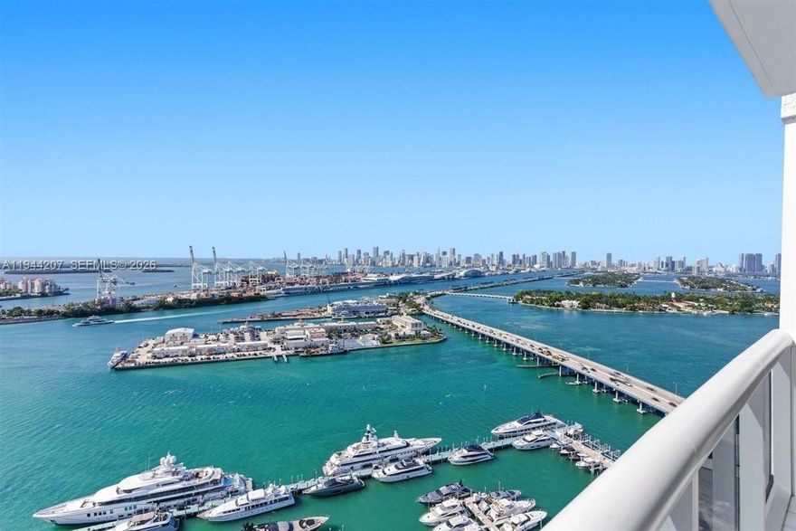 Welcome to 180 degrees of unobstructed views of South Beach, with daily sunrises over Atlantic Ocean and panoramic sunsets over the Miami skyline from 2 spacious balconies. This 3 bedrooms apartment has a private elevator and foyer, Carrera Marble floors, open kitchen, SubZero and Miele appliances distributed in 3,284 sqft. The primary suite has two oversized walk-in closets & spa-like bathroom. The building offers all amenities with pools overlooking the bay, tennis court, private Italian restaurant, concierge, gym, 24-hour valet and reception. Located South of 5th with walking distance to South Beach’s finest restaurants, beach and parks.