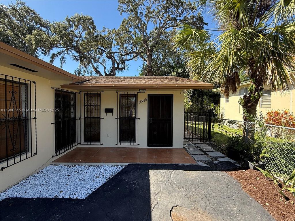 Photo of 1048 NW 32nd Pl #1048, Miami, FL 33125 (MLS # A11906515)