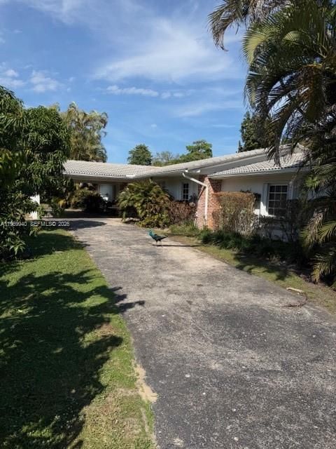 Photo of 14721 SW 67th Ave, Coral Gables, FL 33158 (MLS # A11969940)