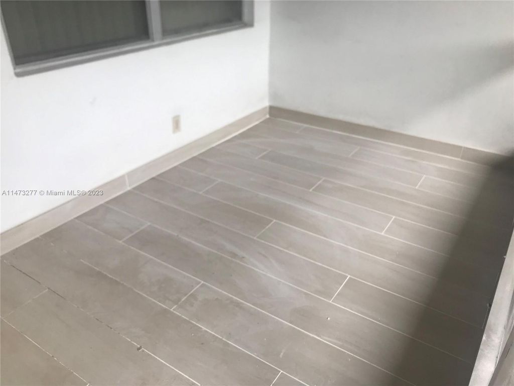 Photo of 501 Blue Heron Dr #108-A, Hallandale Beach, FL 33009 (MLS # A11473277)