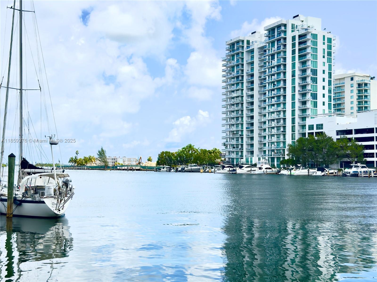 Experience waterfront luxury at Eloquence on the Bay in vibrant North Bay Village. This rare floor-through residence offers breathtaking water views from both east and west, with daily sunrise and sunset panoramas. Extra-tall ceilings and expansive windows with sliding glass doors bathe the home in natural light. Featuring 3 bedrooms and 3 bathrooms, it blends comfort and style with an open layout ideal for living and entertaining. The sleek, contemporary building feels like a resort, boasting a waterfront pool, private marina, and modern amenities—just minutes from Miami Beach and the Mimo District.