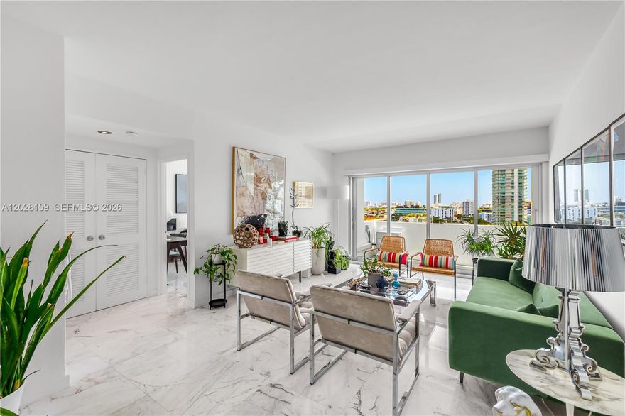Bright and fresh 1 bedroom apartment in cool Morris Lapidus building in Belle Isle. Renovated with sleek carrara marble floors throughout with semi-open kitchen. Spacious bathroom with opening to admire the views with natural light. Impact windows and newly permitted wall-to-wall sliding doors which open both ways to enjoy water and park views from an ample balcony. This condominium
has a stunning west facing pool and deck on the bay to sunbathe and rejoice in the most fantastic sunsets all year round. Located in hip and trendy Belle Isle on the Venetian Causeway, right across The Standard Hotel. Just steps away from restaurants and Trader Joe's, Fresh Market and Publix in Sunset Harbour and Lincoln Road. Ready to move in and easy to show!