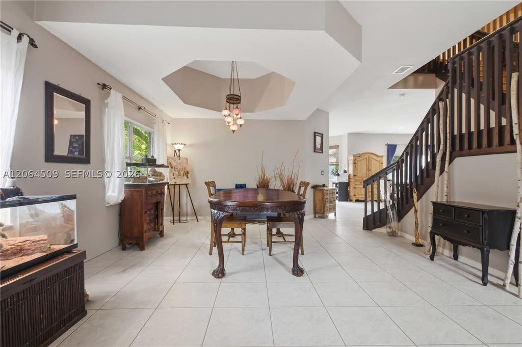 Photo of 1040 NW 185th Ave, Pembroke Pines, FL 33029 (MLS # A12064509)
