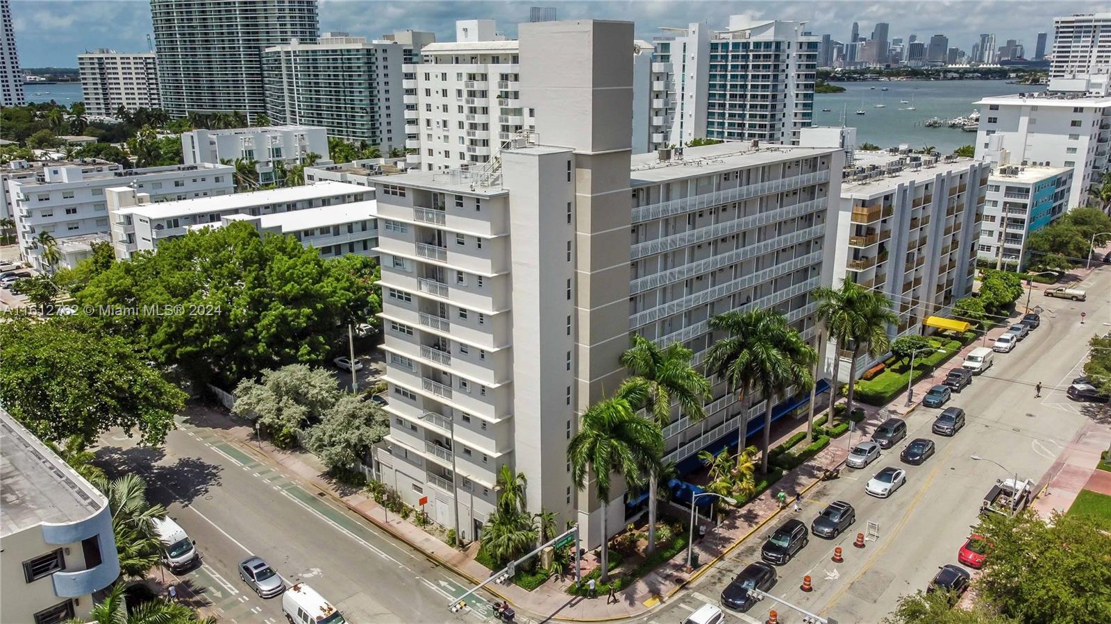 Welcome Home! This lovely 1-bedroom condo offers the perfect blend of comfort and convenience. The unit comes with an assigned parking space, ensuring you always have a place to park. Enjoy the ease of a lobby entrance and the convenience of on-site laundry facilities. Living here, you are within walking distance to Trader Joe's, banks, shops, restaurants, a movie theatre, gym, Publix, post office, concert hall, and the beautiful beach. Plus, the community pool is right outside your apartment, perfect for relaxing or taking a refreshing swim. Don't miss out on this fantastic opportunity – make an appointment to see it now!