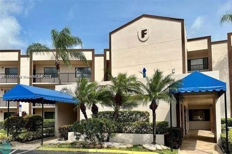 Photo of 9737 N Belfort Cir #108, Tamarac, FL 33321 (MLS # A11756534)