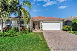 Welcome to this beautifully maintained home in the highly desirable gated community of Oakridge. This residence combines comfort, security, and convenience in one perfect package. Step into the updated kitchen, complete with black stainless steel appliances, perfect for both everyday living and entertaining. The home features two fully renovated bathrooms, a spacious fenced backyard, and a two-car garage for ample parking and storage. Enjoy peace of mind with a new roof and accordion shutters on all windows for storm protection and security. Community perks include tennis courts, a children’s playground, and a picturesque lake. Located within walking distance to houses of worship, shopping, and dining, this home offers the ultimate in location and lifestyle.