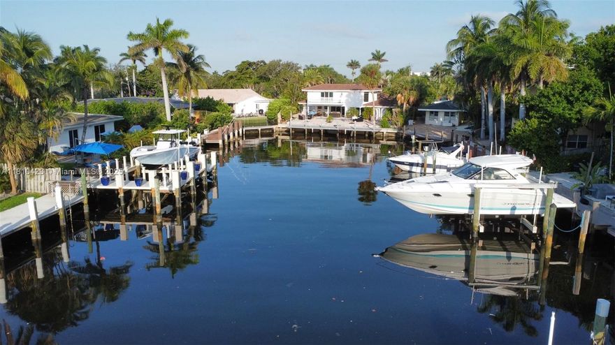 Finally available this amazing property with Large Boat deck place at the end of the canal. Your opportunity to own this rarely available amazing location This almost 3,500 living area home is composed of 4 bedrooms and 4 Bathrooms, Extra Large Living Room with Den for Office or Dinning Area, Open concept Kitchen with view towards the intercostal and the spectacular pool. The covered Terrace and Bbq area are right by the poll for an amazing entertaining space. Over 5 spots for car parking in front of the property. Amazing view of the second floor Master Bedroom. 60 Ft Long Deck , the longest  on the canal, for a large boat slip.
Video available on the link: