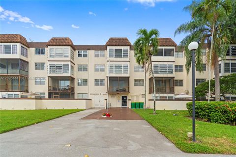 Photo of 7100 NW 17th St #219, Plantation, FL 33313 (MLS # A12026444)