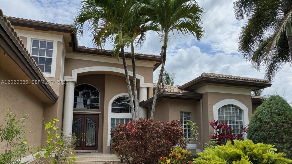 Photo of 10445 Canterbury Ct, Davie, FL 33328 (MLS # A12029685)