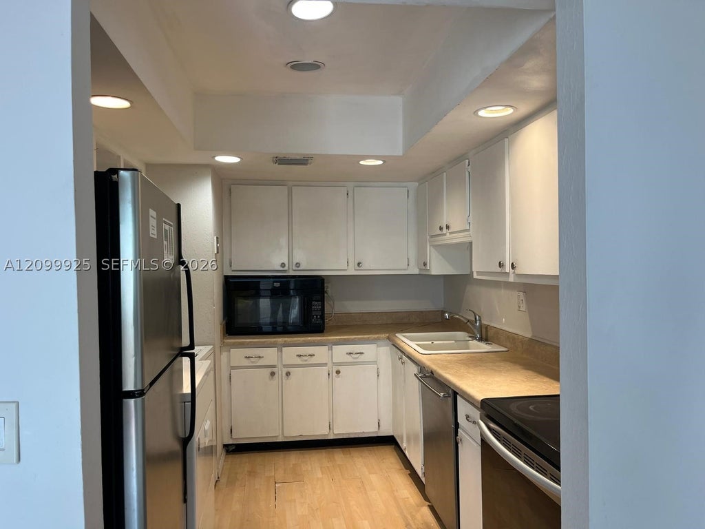 Photo of 2116 NW 58th Ave #23-E, Lauderhill, FL 33313 (MLS # A12099925)