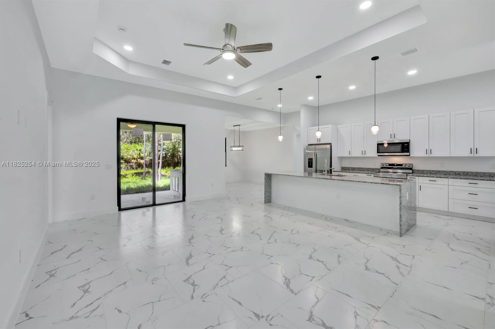 Best priced, biggest and highest quality new construction home in the area! Experience modern Florida living in this 3+den, 2-bath home. Enjoy 1,812 sq. ft. with impact windows/doors, glossy tile floors, and an open layout under tray ceilings. The gourmet kitchen features quartz counters, stainless appliances, soft-close cabinets, and a large island. Retreat to a spacious primary suite with ample closets and a spa-like bath. The covered lanai, equipped with an outdoor sink and prep station, is perfect for bbq's. Easy access to new shops, restaurants convenient access to the amenities of Fort Myers just a short drive away via SR-80, I-75, parks, and beaches, this home delivers style, comfort, and incredible value. Seller offering $5,000 credit on a full offer!