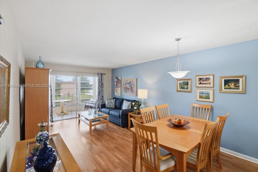 Impeccably maintained 1BR/1BA residence in a desirable 55+ community, offering one of the most compelling value opportunities in South Florida. Features include a white shaker cabinet kitchen, tile and laminate floors, and a walk-in adapted soaking tub for comfort and accessibility. The enclosed balcony expands the living area and showcases tranquil lake views. Furniture could be acquired separately. Resort-style amenities include indoor & outdoor pools, tennis courts, fitness center, billiards, BBQ/picnic areas, recreation facilities, and an expansive clubhouse. Peaceful location near shopping, dining, and major roadways.