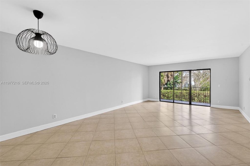 Photo of 16541 Blatt Blvd #205, Weston, FL 33326 (MLS # A11977216)