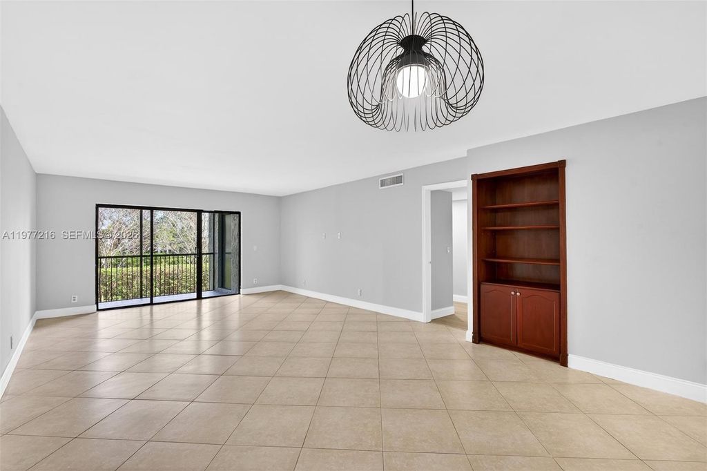 Photo of 16541 Blatt Blvd #205, Weston, FL 33326 (MLS # A11977216)