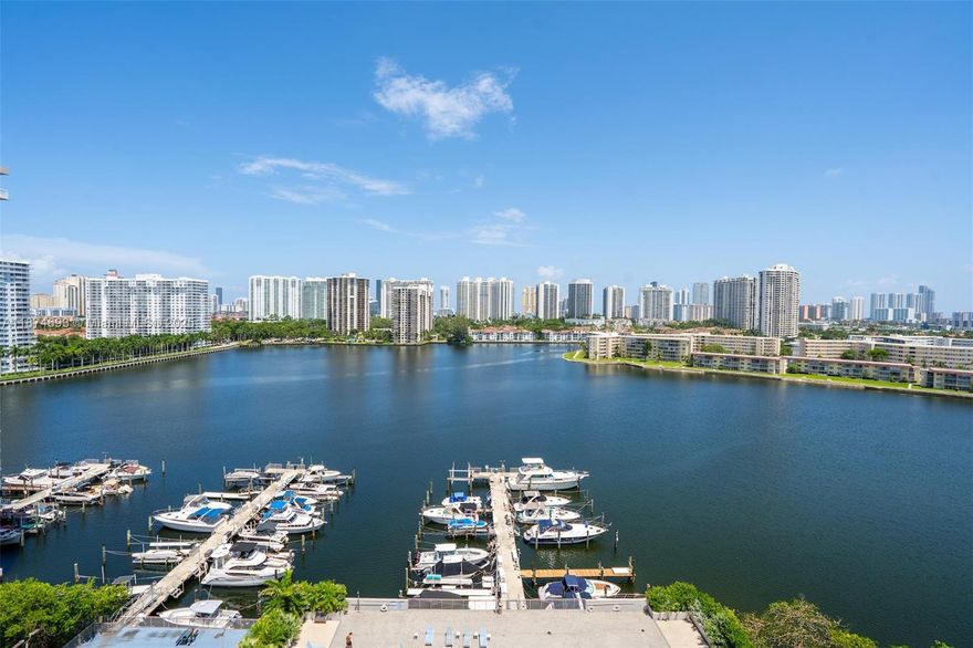 Welcome to your waterfront oasis at Del Prado, located in the heart of Aventura. This 2-bed, 2-bath highrise condo boasts 1605 sq ft of luxury living space with breathtaking Intracoastal views. Step inside to spacious living areas, an open kitchen concept with an oversized granite eat-in island perfect for dining, and sleek bathrooms. Enjoy resort-style amenities including a gym, tennis court, game room, and a common outdoor space with a barbecue area for entertaining. Condo is gated with guard, has an elevator, garage, and laundry in the building, convenience is at your fingertips. Indulge in the serene waterfront lifestyle in a boaters paradise, steps away from the on site marina.