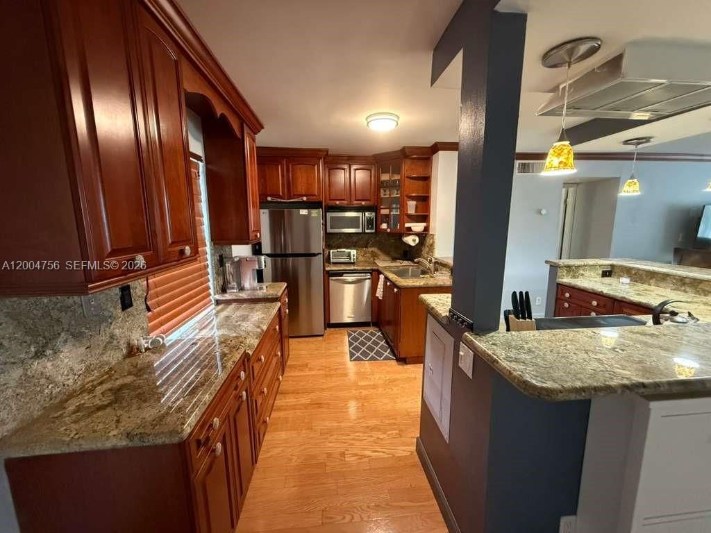 Photo of 2691 S Course Dr #202, Pompano Beach, FL 33069 (MLS # A12004756)