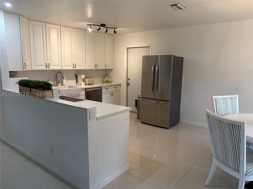 Photo of 3721 W Valley Green Dr #48, Davie, FL 33328 (MLS # A12096751)