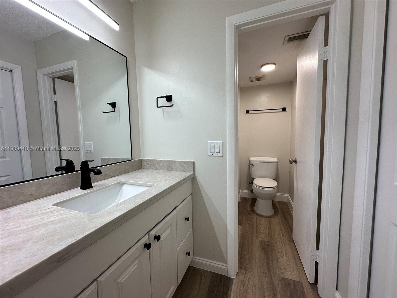 RACQUET CLUB APARTMENTS A - Residential Lease