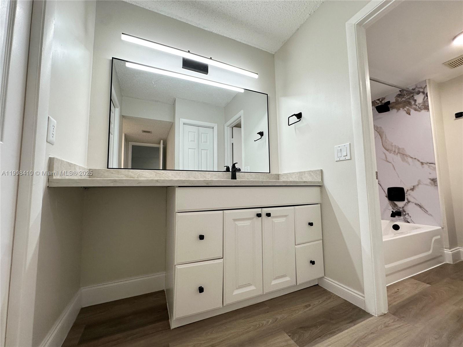 RACQUET CLUB APARTMENTS A - Residential Lease