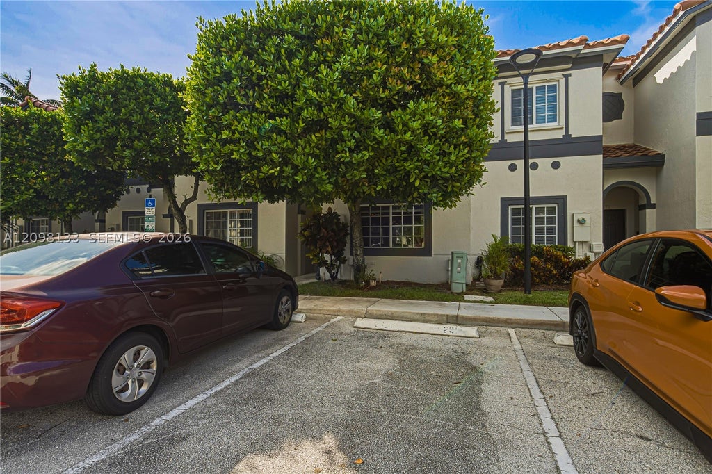 Photo of 7909 Catalina Cir, Tamarac, FL 33321 (MLS # A12098133)
