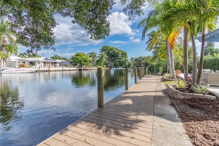 Central Wilton Manors 3 bedroom, 2 bath waterfront home with true one car garage & heated pool. Dramatic views of pool and river as soon you walk in. Ocean access w/ fixed bridges great for Kayaking, paddling, sm boat. New Dock, open kitchen w/ ss appliances, granite counters, bar seating. Neutral tile floors in main living area and laminate wood flooring in bedrooms. Neutral bathrooms w/ floor to ceiling tile. Recessed lighting, updated electric, closet built ins, tankless water heater, new dock, screened Florida room, family room & bonus 4th bedroom/office. Covered front entry, courtyard, fenced yard, two driveways great for boat/trailer/RV etc. Located in the heart of central Wilton Manors less than a mile from Wilton Drive shopping, restaurants, nightlife, easy access to I95 & beach.