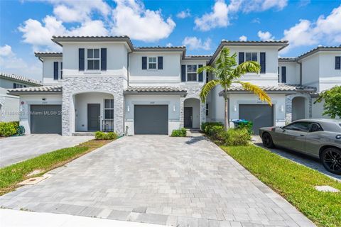 Photo of 11927 NW 46th St, Coral Springs, FL 33076 (MLS # A11864829)