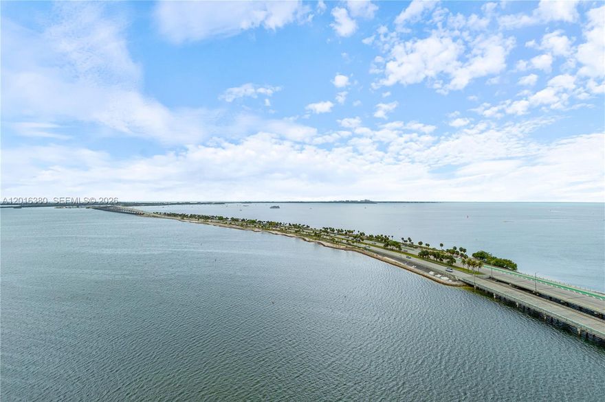 Brickell's newest waterfront gem! Gorgeous water front condo with stunning finishes throughout. Floor to ceiling glass wrapping around the entire unit with North east views of the bay. white washed porcelain wood tile flooring throughout, the home showcases a sleek, fully equipped kitchen with premium Gaggenau appliances. The spacious living and dining area extend beautifully onto a generous terra, creating a seamless flow. UNA Residence is newly completed water front tower offering an upscale resort style living experience. Offering amenities like multiple pools, saunas, steam rooms, gym, massage rooms and banquet hall just to name a few. Centralized location puts you at the heart of Miami's entertainment offerings. Do not miss out on this opportunity.
