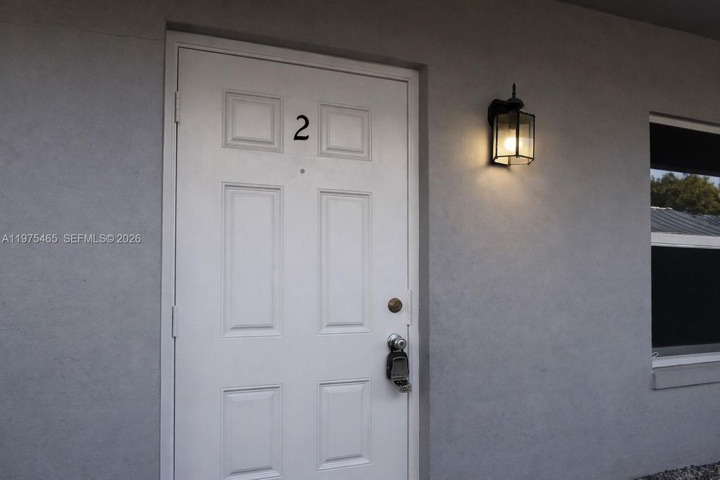 Photo of 3841 NE 3rd Ave #2, Oakland Park, FL 33334 (MLS # A11975465)