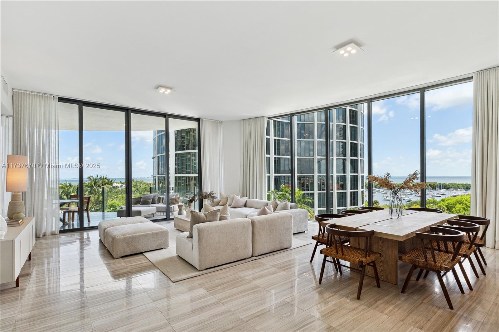 Experience this dream home in the sky situated in the prestigious A line of Two Park Grove. This remarkable 4-bed, 5.5-bath corner residence offers over 3,200 square feet of refined living space, soaring 12-foot ceilings, breathtaking water views, and a private elevator entry for ultimate exclusivity. Enjoy custom closets, elegant window treatments, and top-of-the-line Wolf appliances in the gourmet open kitchen. Park Grove presents exceptional amenities such as full-service concierge, 24-hour valet, a state-of-the-art fitness center, signature spa, children's play room, landscaping by Enzo Enea, and more. Seize this opportunity to experience the pinnacle of luxury living in the heart of Coconut Grove, Miami’s most sought-after neighborhood. Currently tenant occupied until 7/31/25
