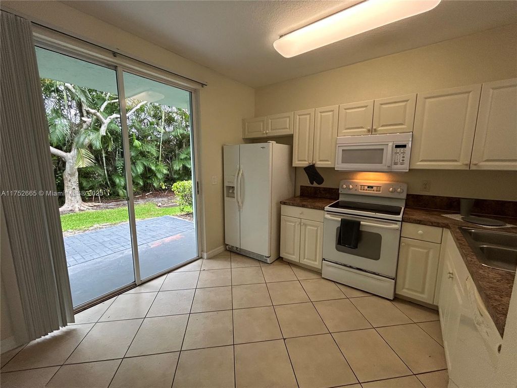 Photo of 1924 Alamanda Way #1924, Riviera Beach, FL 33404 (MLS # A11752665)