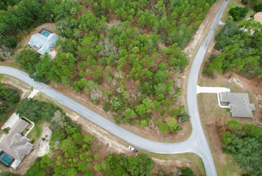 Prime 1.01 Acre Wooded Corner Lot in Pine Ridge Estates, Beverly Hills, Fl. Build your dream home in this quiet yet vibrant neighborhood that blends outdoor living with a strong sense of community. Amenities include approximately 27 miles of scenic equestrian trails, equestrian complex, community center, bike trails, lighted tennis and pickleball courts, community playground, and even a dedicated area for radio-controlled planes.
Centrally located in Citrus County, close to schools and major highways. Not in a flood zone. Low HOA.