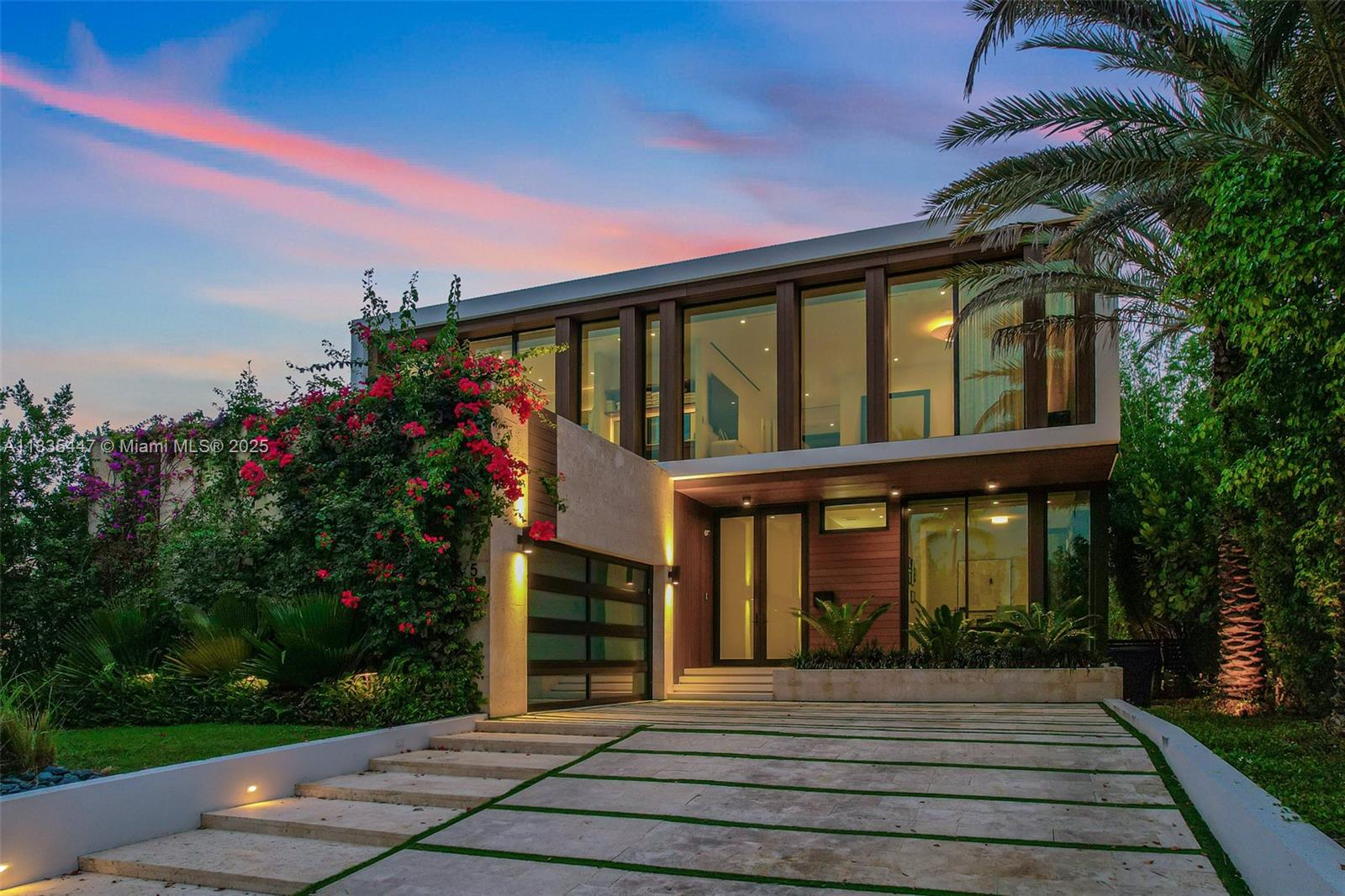 Modern luxurious home overlooking a beautiful Golf Course. This 5-bed, 6-bath residence offers over 5,200 sq ft of refined living space for comfort and style. Soaring ceilings, sleek European flooring, skylights, and floor-to-ceiling glass flood the interiors with natural light. The chef’s kitchen features Italian Boffi cabinetry, Sub-Zero/Wolf appliances, and designer fixtures. A beautiful wooden staircase leads to the primary suite with private terrace and panoramic vistas. A junior suite overlooks the pool, while the rooftop terrace captures sunrise and sunset. Inside, enjoy a new wine cellar and spa-like baths. The backyard is made for entertaining with a heated pool, spa, cabana bath, and full summer kitchen. Just minutes from Sunset Harbour's shops, dining, gyms, and Sunset Padel.