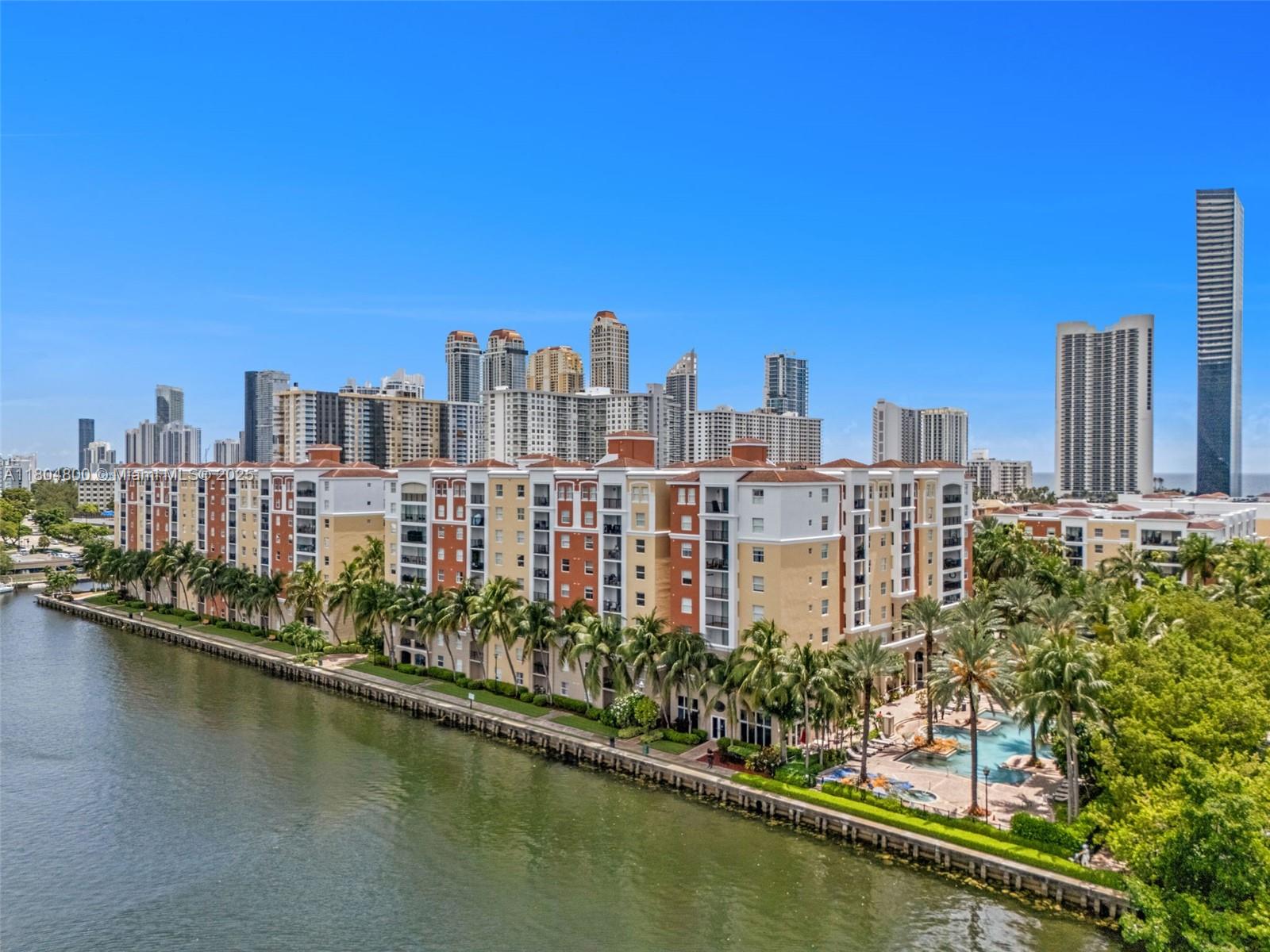 Bright and clean 2-bedroom, 2-bath unit in the main building of Porto Bellagio. New lighting, brand new A/C, in-unit washer & dryer, and laminated wood flooring. Tile in kitchen and bathrooms. Mediterranean-style complex with top amenities: 2 pools, jacuzzi, gym, clubhouse, business center, BBQ area, and promenade. Just a short walk to the beach, parks, restaurants, shops, and top-rated K–8 Sunny Isles school.