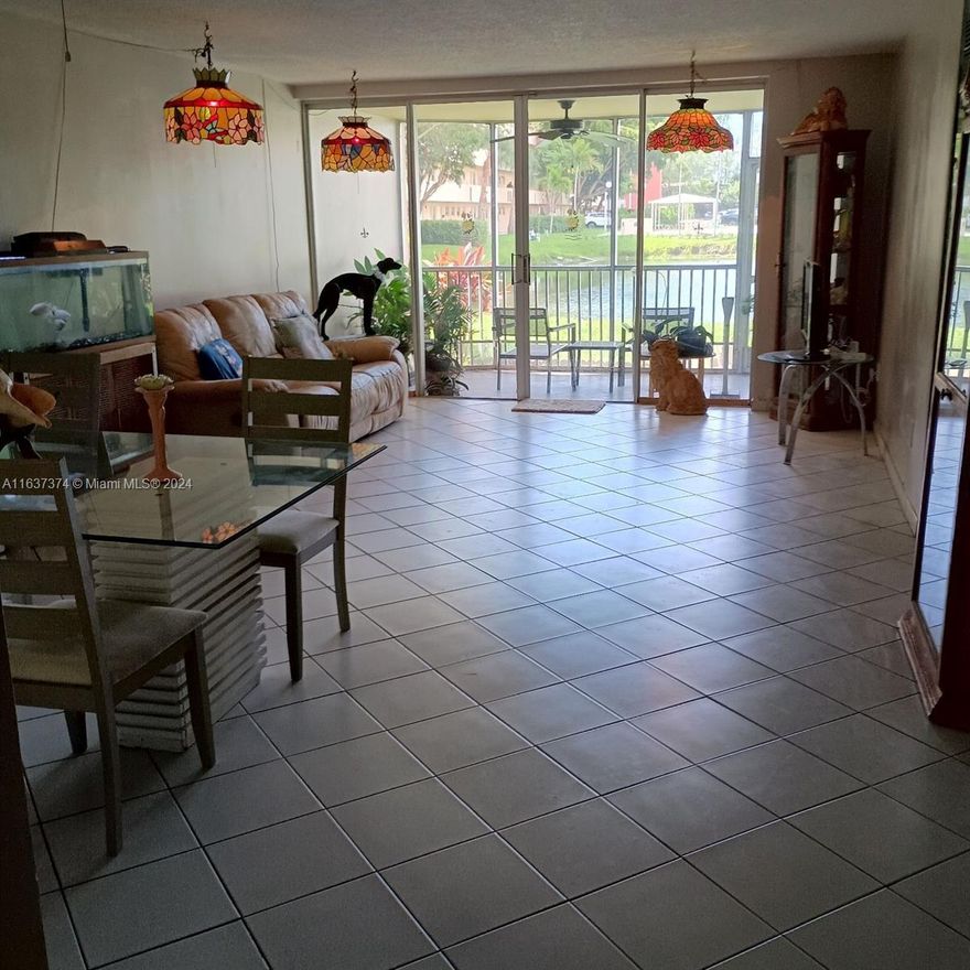 Enjoy the peaceful water view from this amazing 2/2 apartment located on the first floor. Has an ample screened porch, tiles all over the apartment, new refrigerator, in open concept kitchen, lots of closet space. Gated community with 24/7 security patrol, Guest parking, lots of lush green areas and lake. Walk to Publix and shopping areas, Close to Aventura, and Highways I95 and 826.
 Pet friendly 25 lbs and under.
 Rentals allowed after 2 years. Equal Housing Opportunity.