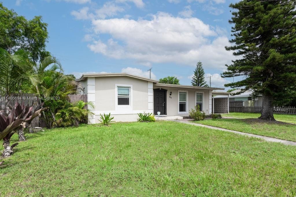 Photo of 250 SW Airoso Blvd, Port Saint Lucie, FL 34983 (MLS # A11405694)